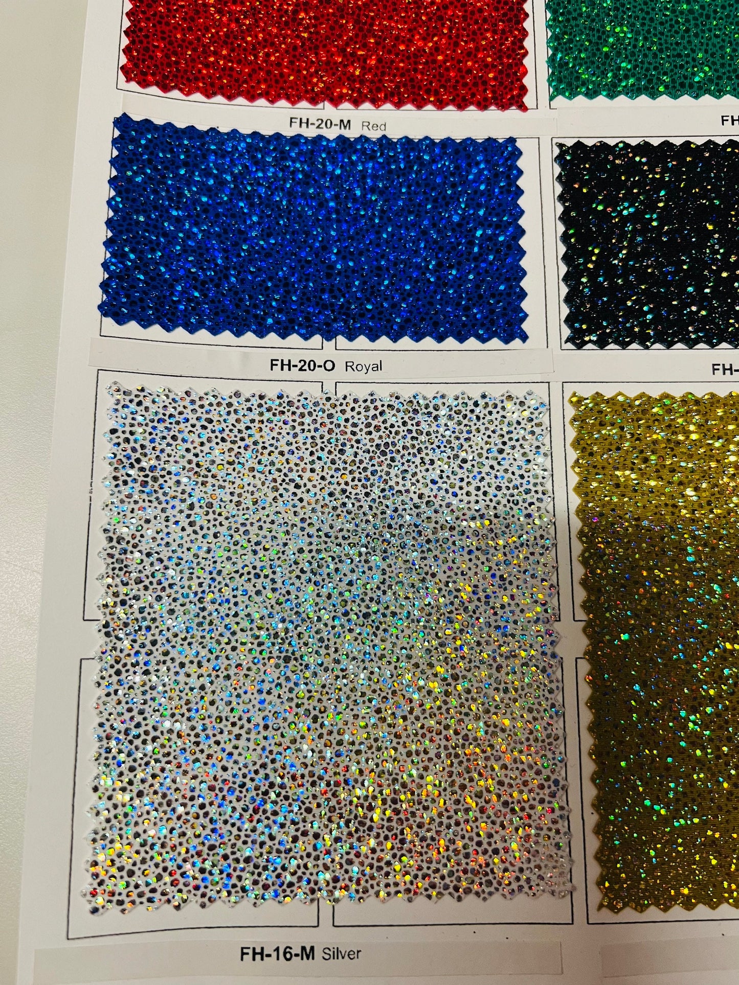 Pebbles hologram metallic nylon spandex design best quality of spandex 4-way stretch 58/60” Sold by the YD.