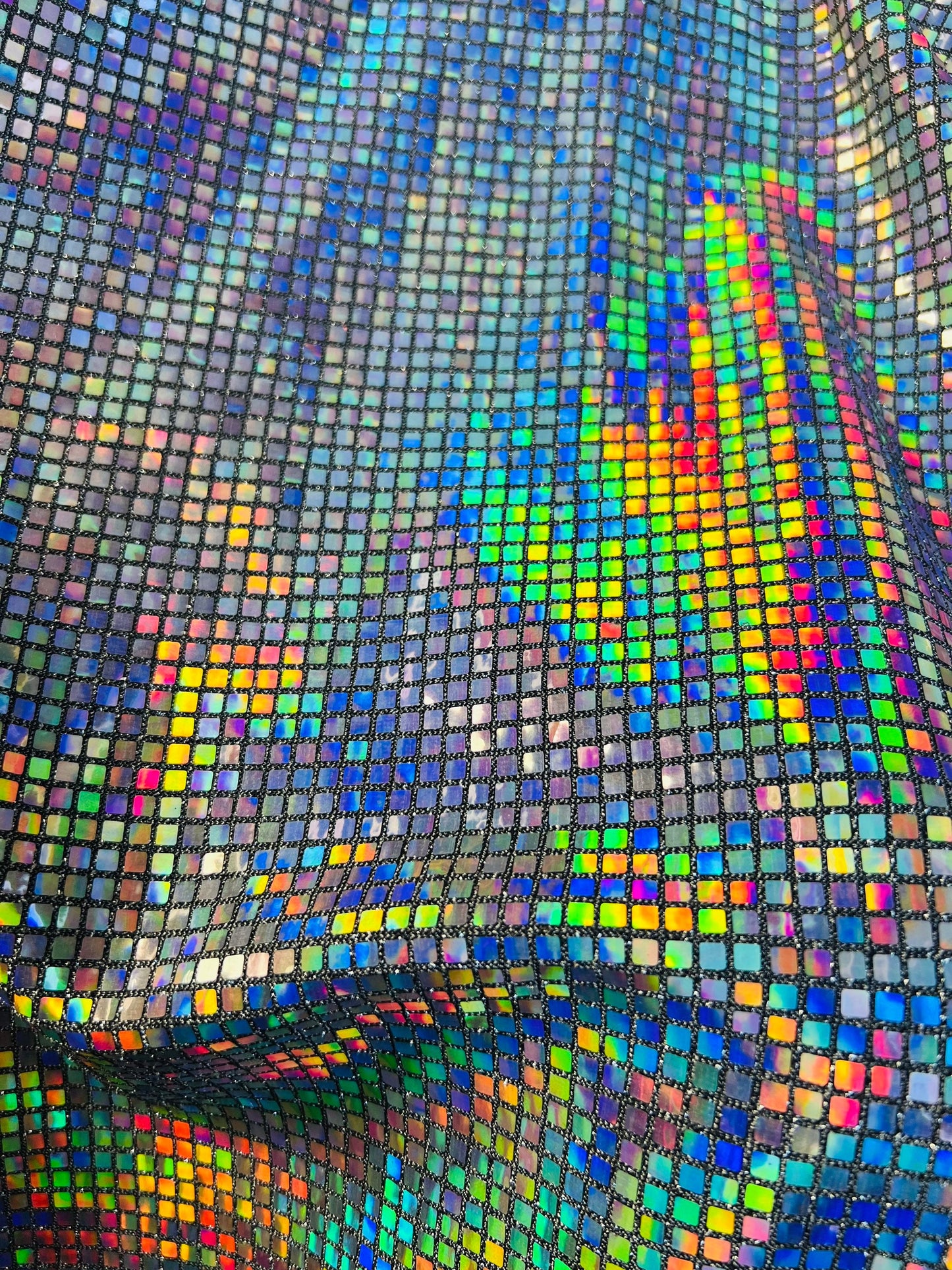 New square hologram sequins 5mm spectrum color on metallic nylon base 2-way stretch 58/60” Sold by the YD. Ships Worldwide from Los Angeles