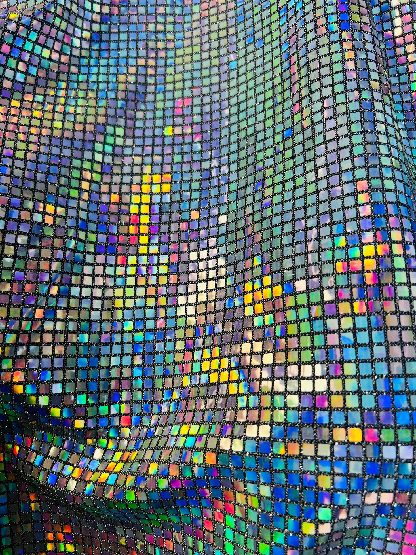 New square hologram sequins 5mm spectrum color on metallic nylon base 2-way stretch 58/60” Sold by the YD. Ships Worldwide from Los Angeles