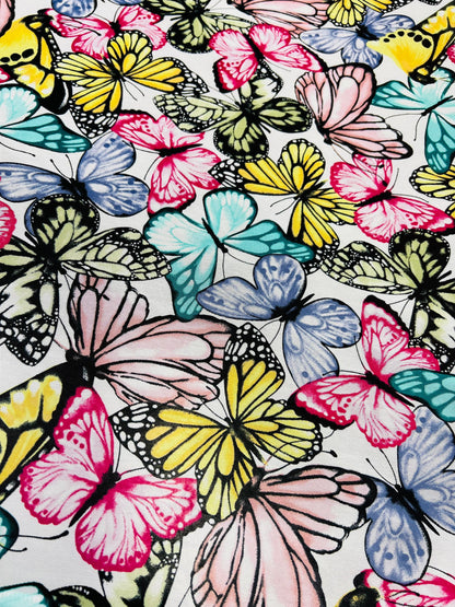 Butterfly design multicolor print on power mesh spandex 4-way stretch 58/60” Sold by the YD. Ships Worldwide from Los Angeles California USA