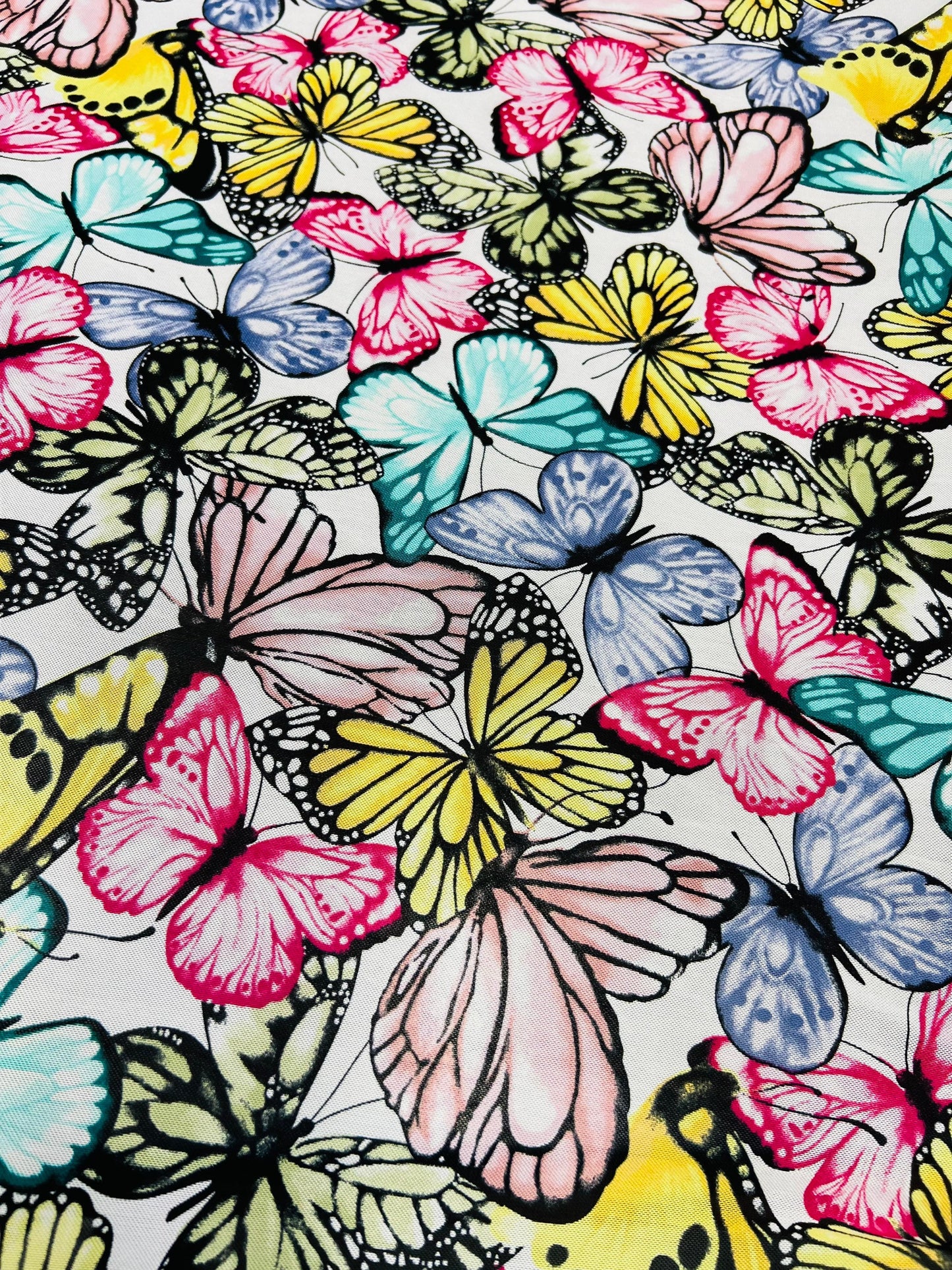 Butterfly design multicolor print on power mesh spandex 4-way stretch 58/60” Sold by the YD. Ships Worldwide from Los Angeles California USA