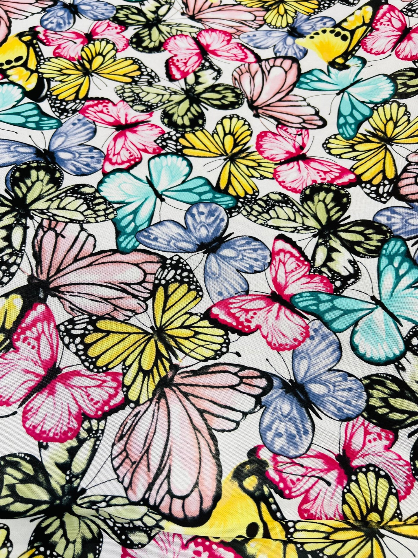 Butterfly design multicolor print on power mesh spandex 4-way stretch 58/60” Sold by the YD. Ships Worldwide from Los Angeles California USA