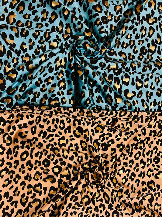 New exotic metallic leopard design nylon spandex 4-way stretch it glows in the dark 58/60” Sold by the YD. Ships worldwide from Los Angeles