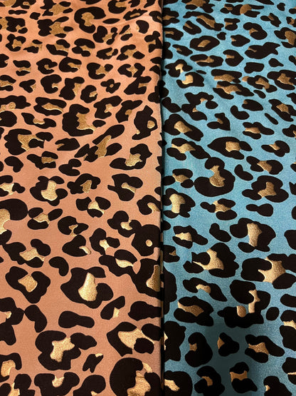 New exotic metallic leopard design nylon spandex 4-way stretch it glows in the dark 58/60” Sold by the YD. Ships worldwide from Los Angeles