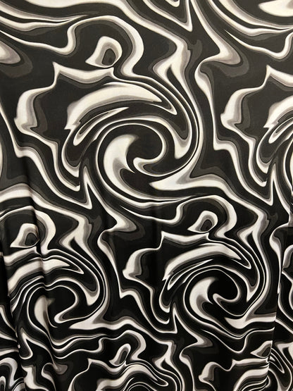 New Modern abstract lava design Black/white/gray print on best quality of nylon spandex 4-way stretch 58/60” Sold by the YD. Ships Worldwide