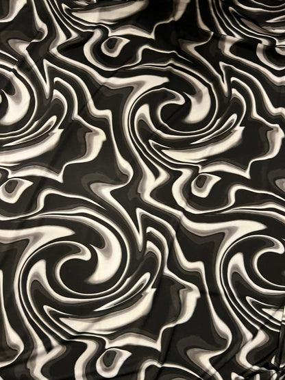 New Modern abstract lava design Black/white/gray print on best quality of nylon spandex 4-way stretch 58/60” Sold by the YD. Ships Worldwide