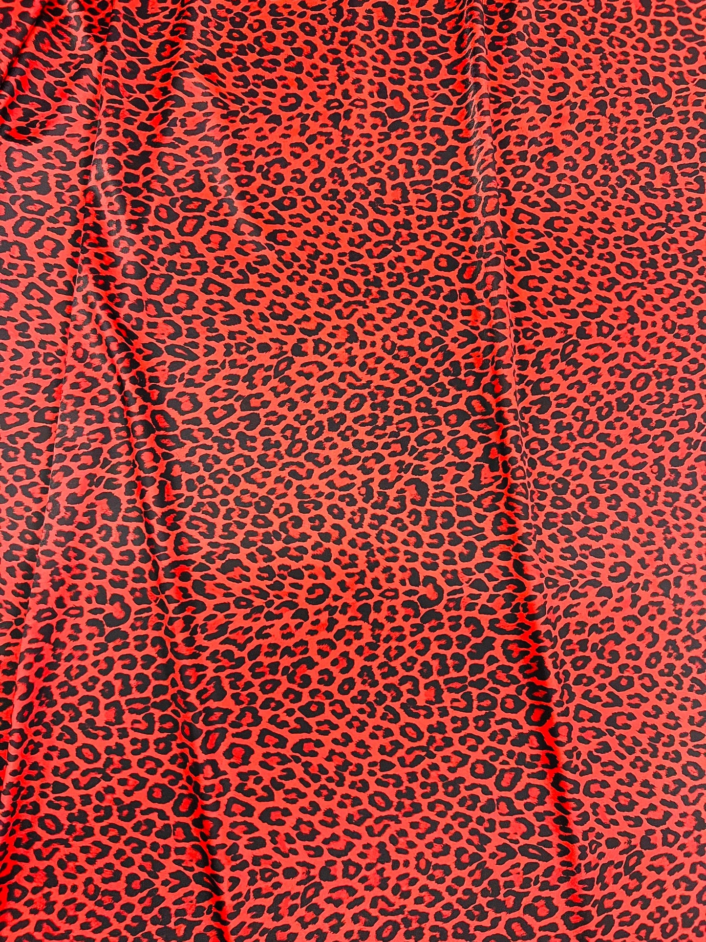 New Exotic Leopard design Red/Black print on great quality of Nylon spandex 4-way stretch 58/60” Sold by the YD. Ships Worldwide