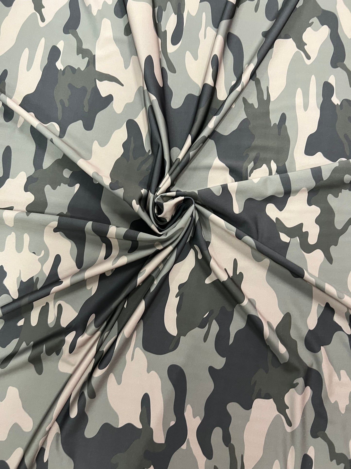 New camouflage design print on best quality of Nylon spandex 4-way stretch 58/60” Sold by the YD.