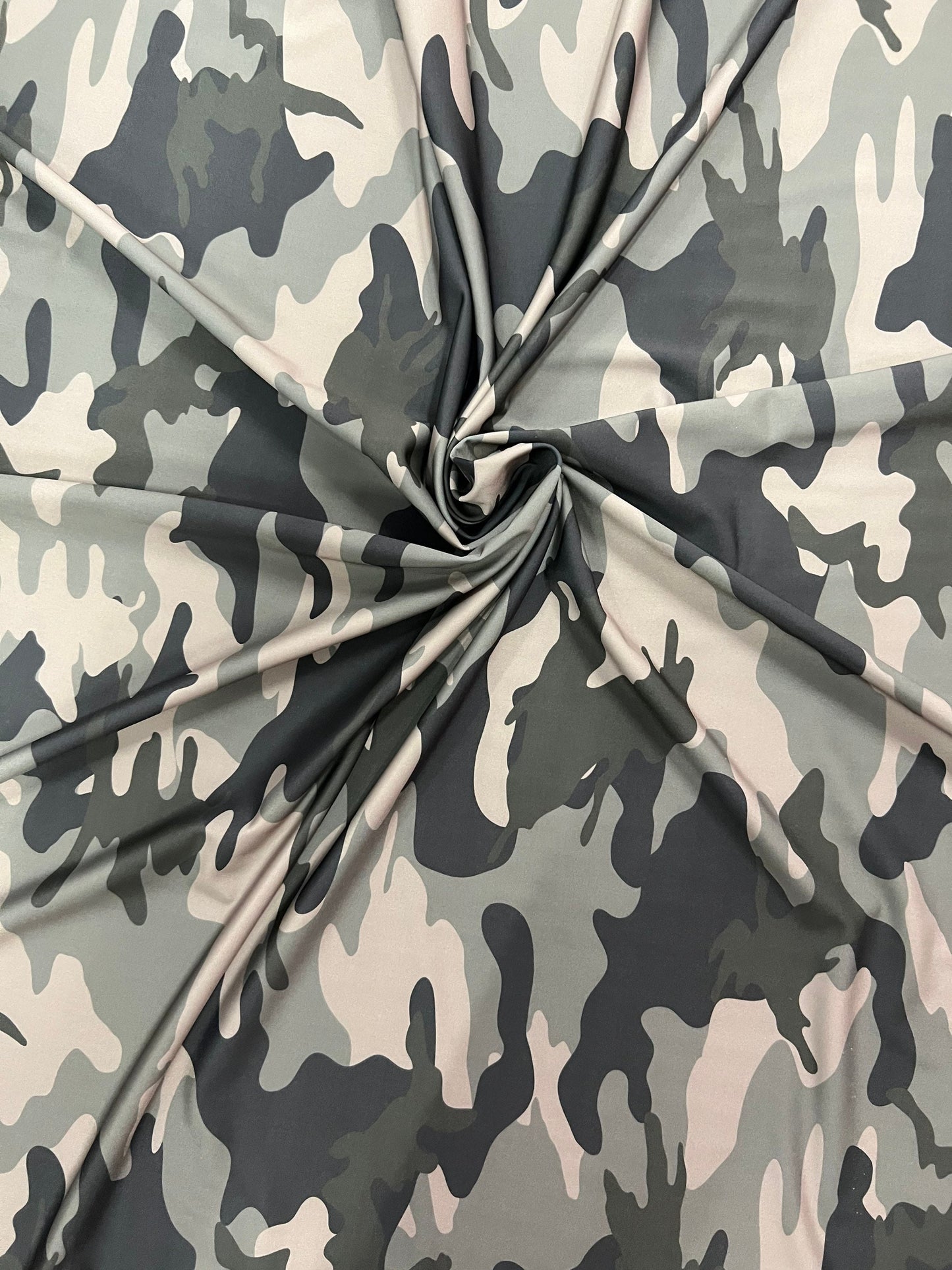 New camouflage design print on best quality of Nylon spandex 4-way stretch 58/60” Sold by the YD.