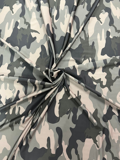 New camouflage design print on best quality of Nylon spandex 4-way stretch 58/60” Sold by the YD.