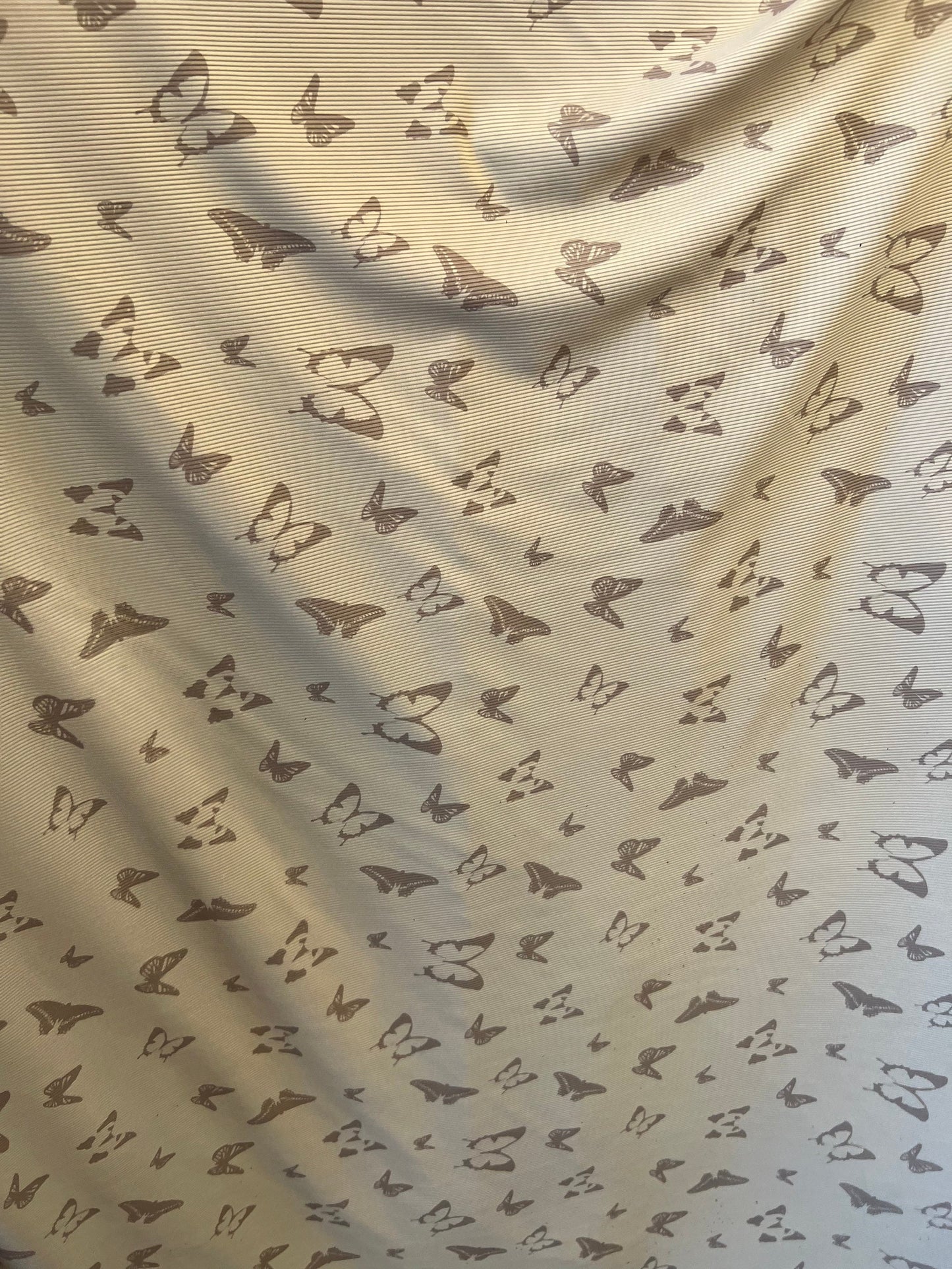 New Butterfly design Ribbed spandex Taupe color 4-way stretch 55/57” Sold by the YD. Ships Worldwide from Los Angeles California USA