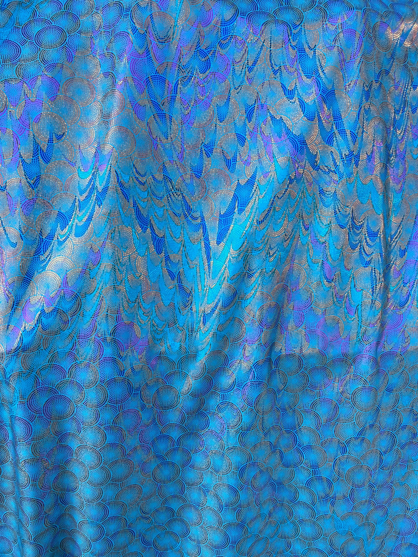 New peacock design hologram Aqua turquoise hologram metallic nylon spandex 4-way stretch 58/60” Sold by the YD. Ships worldwide