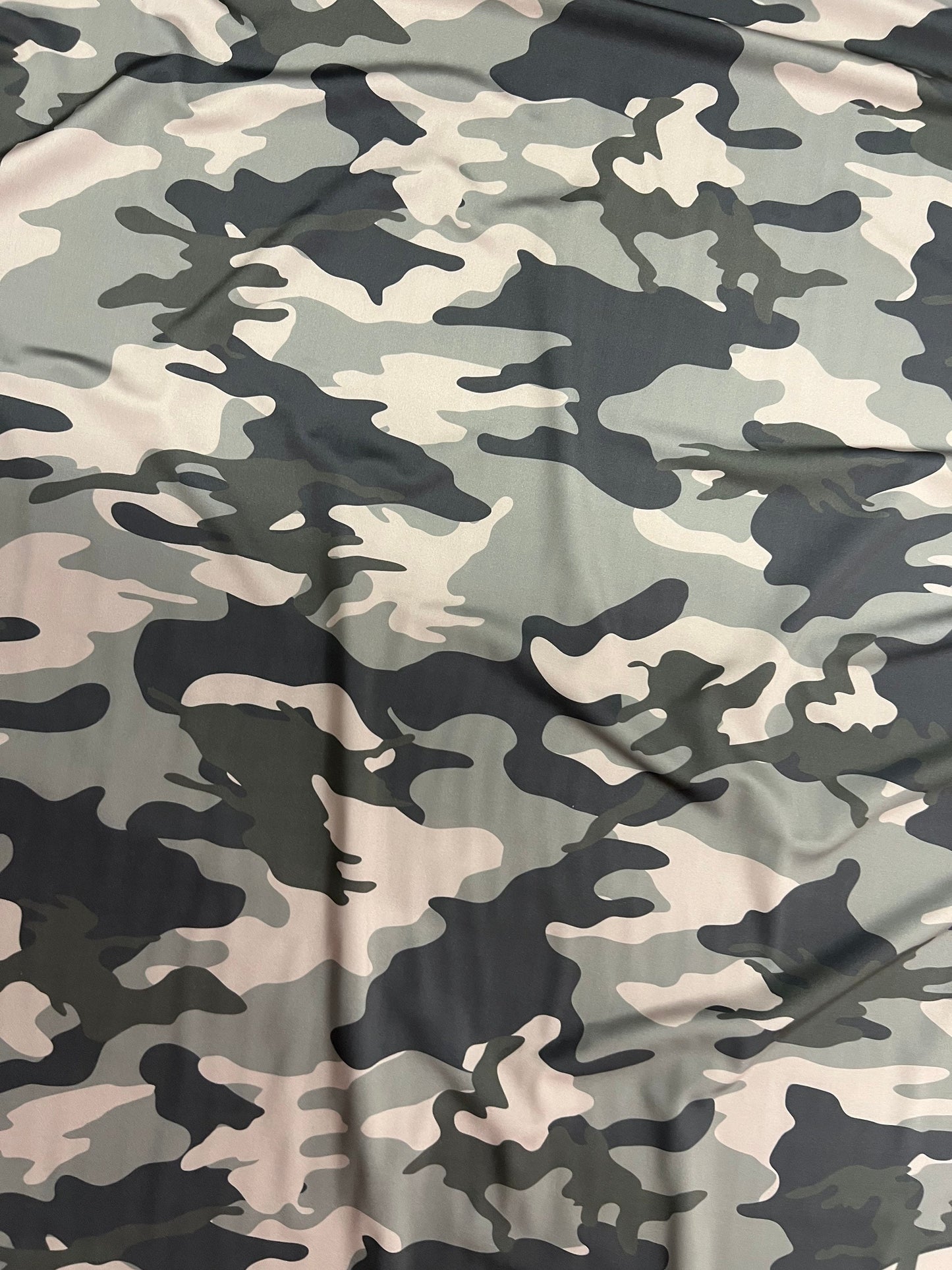 New camouflage design print on best quality of Nylon spandex 4-way stretch 58/60” Sold by the YD.