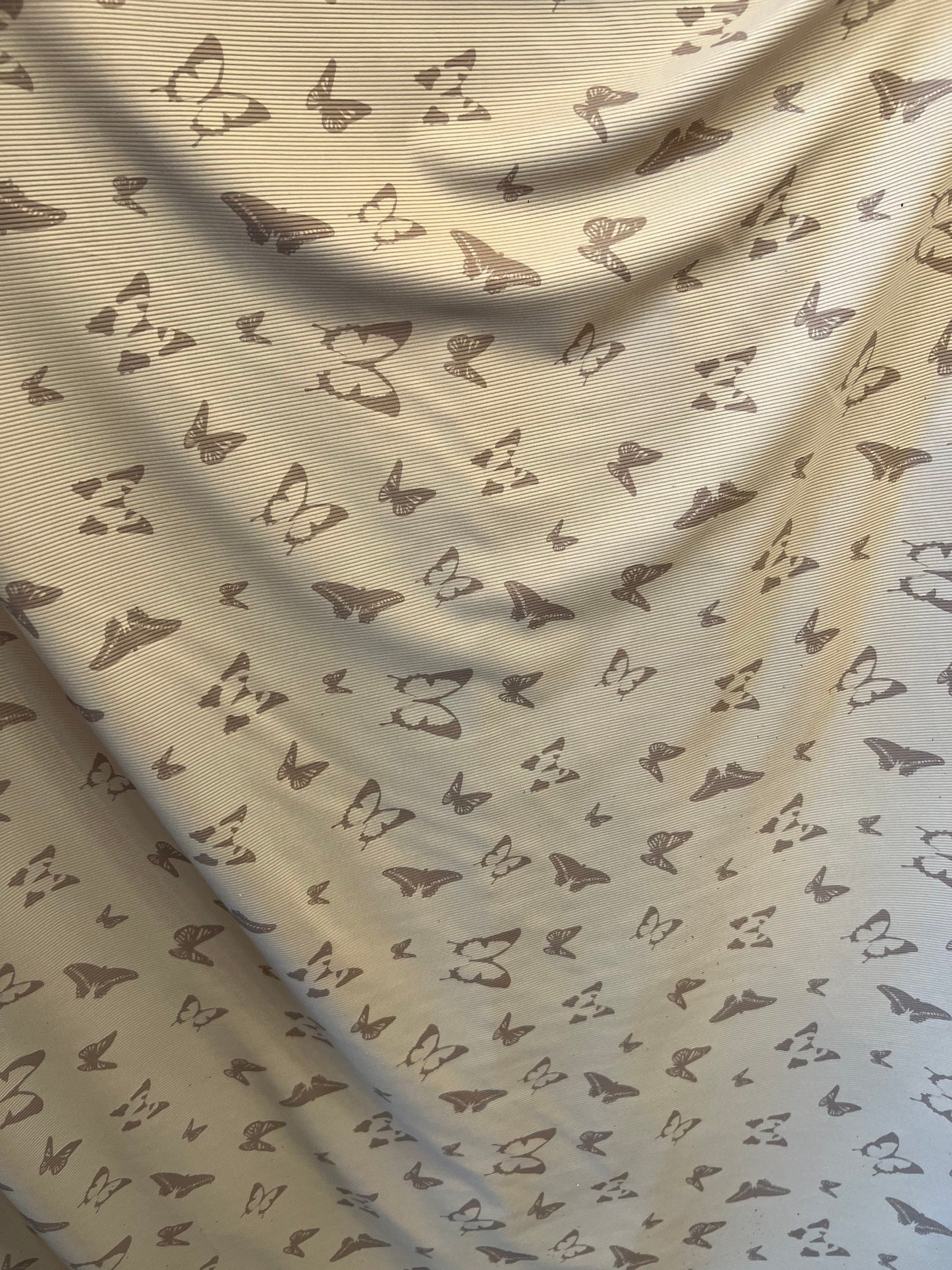 New Butterfly design Ribbed spandex Taupe color 4-way stretch 55/57” Sold by the YD. Ships Worldwide from Los Angeles California USA