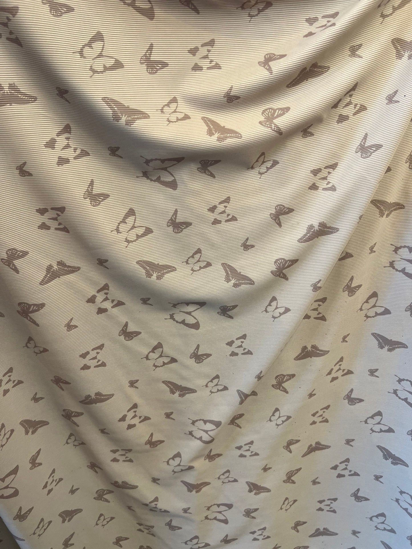 New Butterfly design Ribbed spandex Taupe color 4-way stretch 55/57” Sold by the YD. Ships Worldwide from Los Angeles California USA