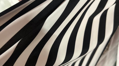 Stripe design print on nylon spandex 4way stretch 58/60" sold by the yd. Ships worldwide from Los Angeles California USA.