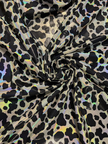 Cow design on Luxury metallic lacer nylon spandex 4-way stretch 58/60” Sold by the YD. Ships worldwide from Los Angeles California USA