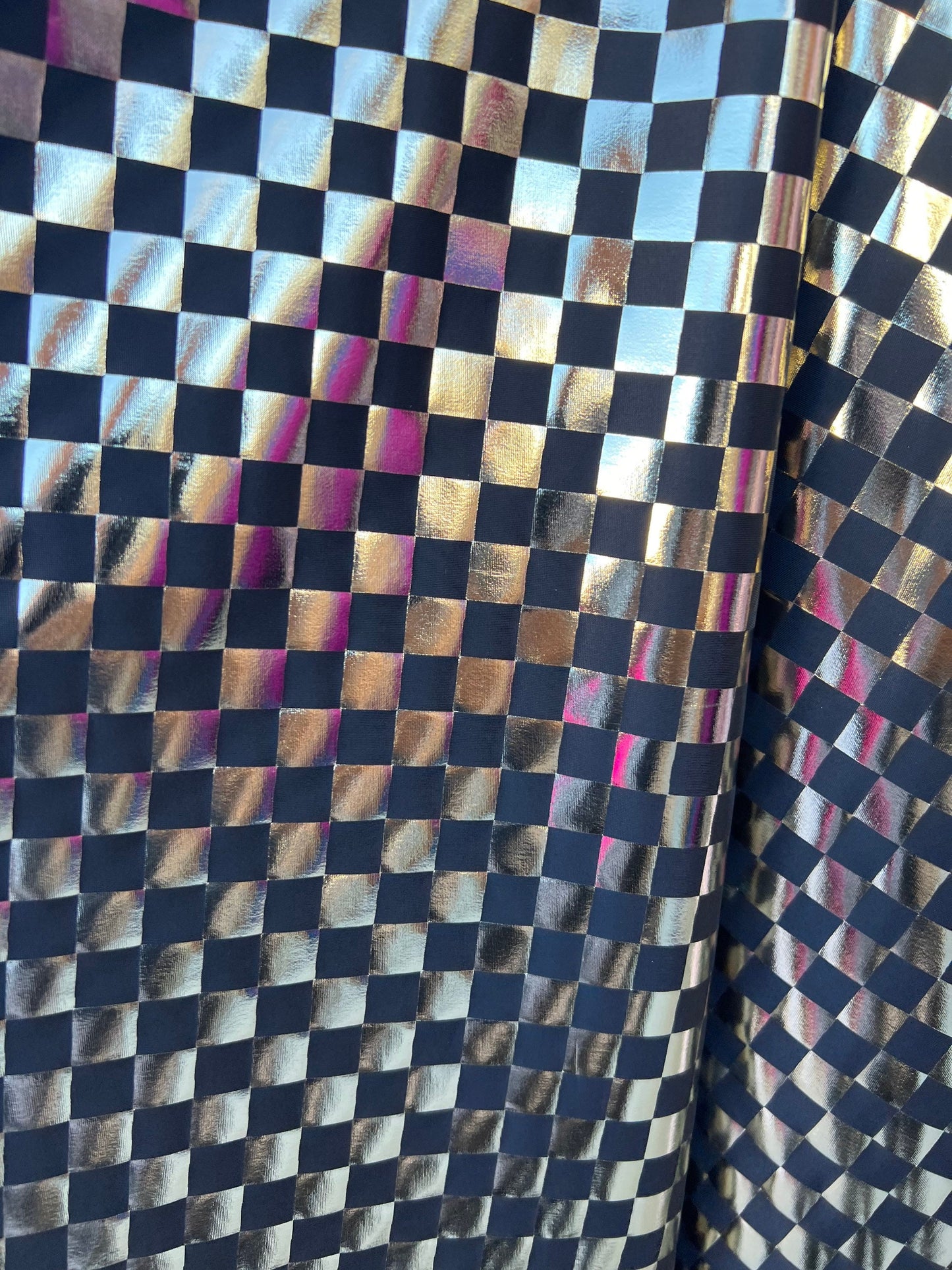 Checkered design metallic poly spandex 2-way stretch 58/60” Sold by the YD. Ships Worldwide from Los Angeles California USA