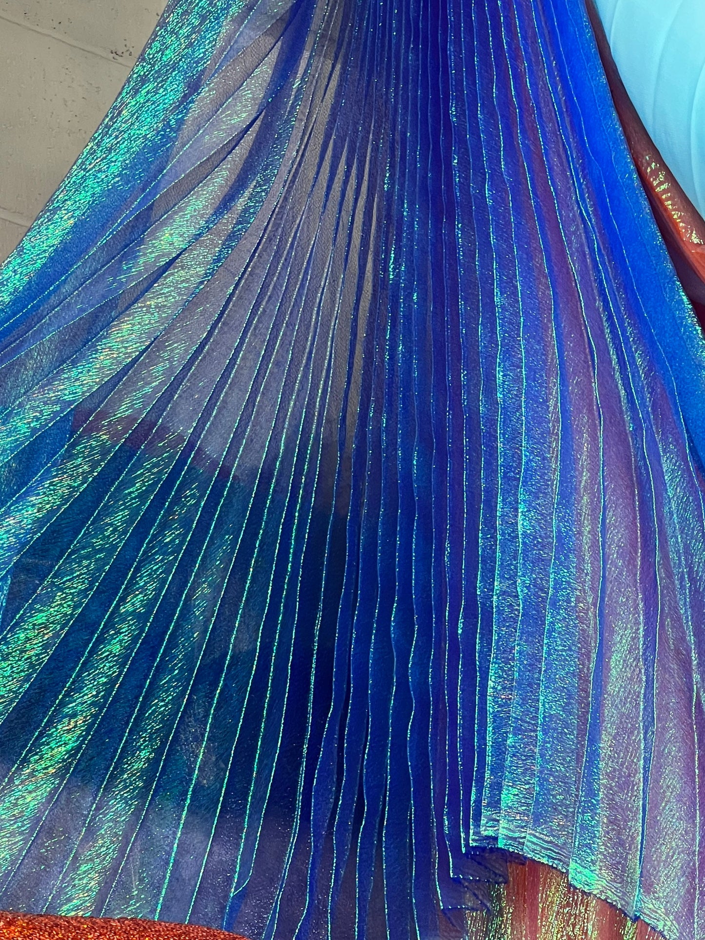 Sunburst pleated fabrics iridescent metallic organza 108” length by 56” width Sold by the PC ships worldwide from Los Angeles California USA