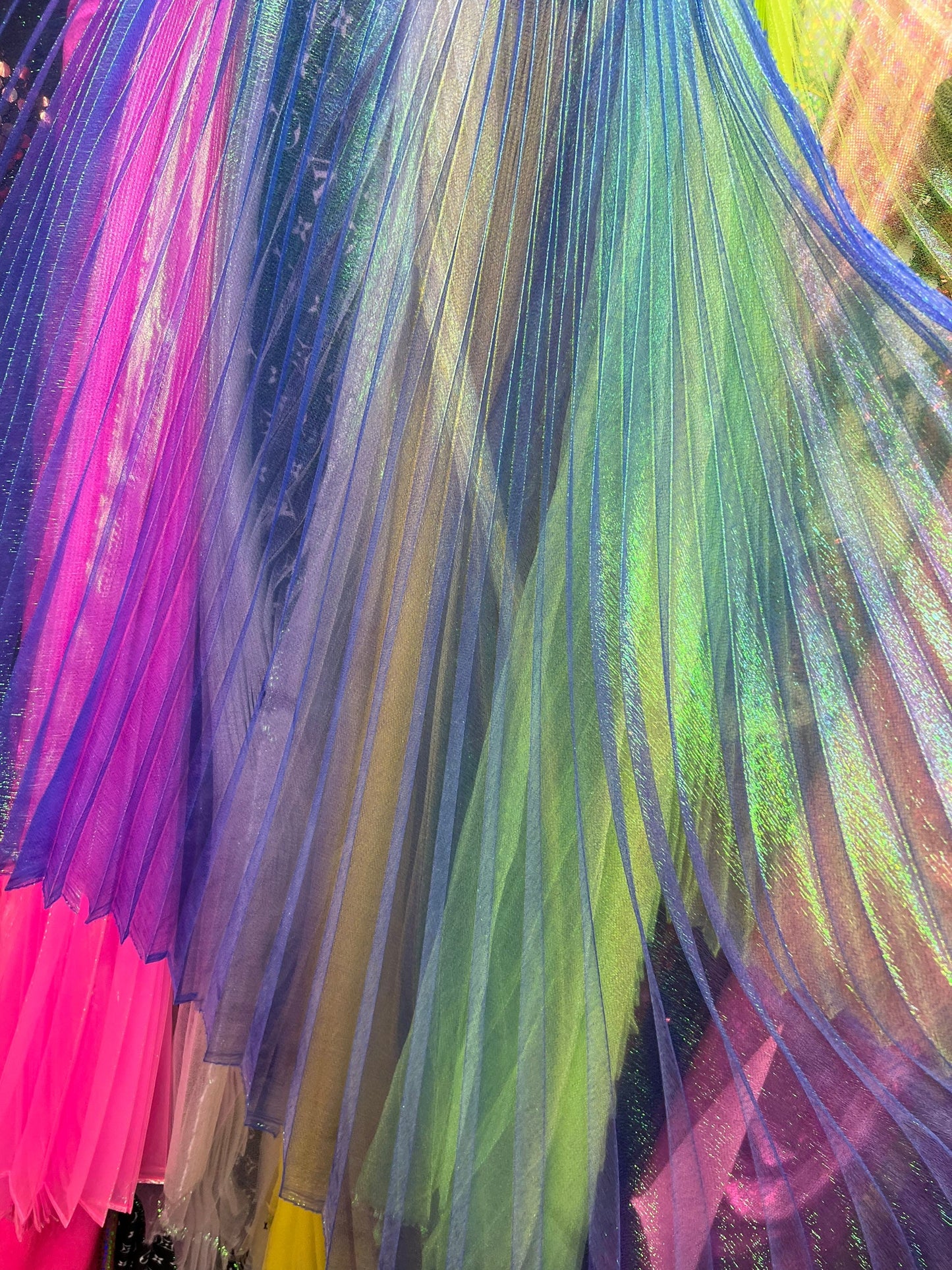 Sunburst pleated fabrics iridescent metallic organza 108” length by 56” width Sold by the PC ships worldwide from Los Angeles California USA