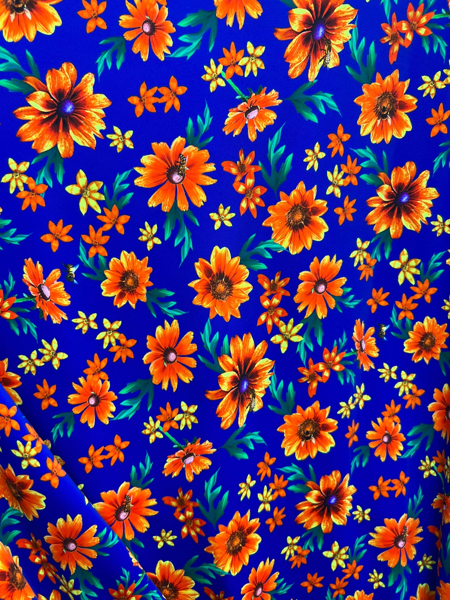 Floral romantic design sapphire/multi print Nylon spandex 4-way stretch 58/60” Sold by the YD. Ships worldwide from Los Angeles CA