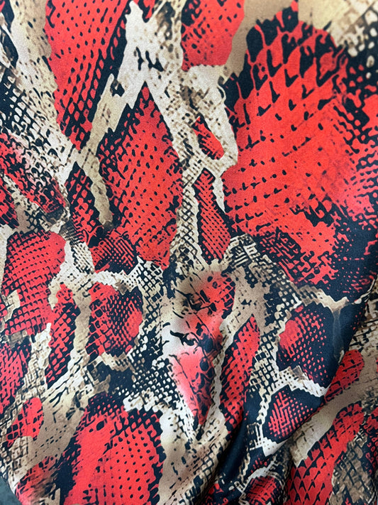 New Exotic snake skin design print on Nylon spandex 4-way stretch 58/60” Sold by the YD. Ships worldwide from Los Angeles California USA