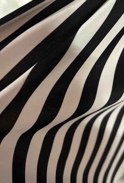 Stripe design print on nylon spandex 4way stretch 58/60" sold by the yd. Ships worldwide from Los Angeles California USA.