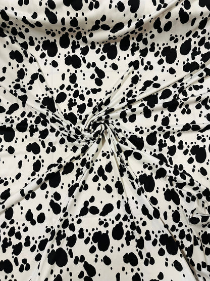 Dalmatian design print on great quality of poly spandex 2-way stretch 58/60” Sold by the YD. Ships Worldwide from Los Angeles California.