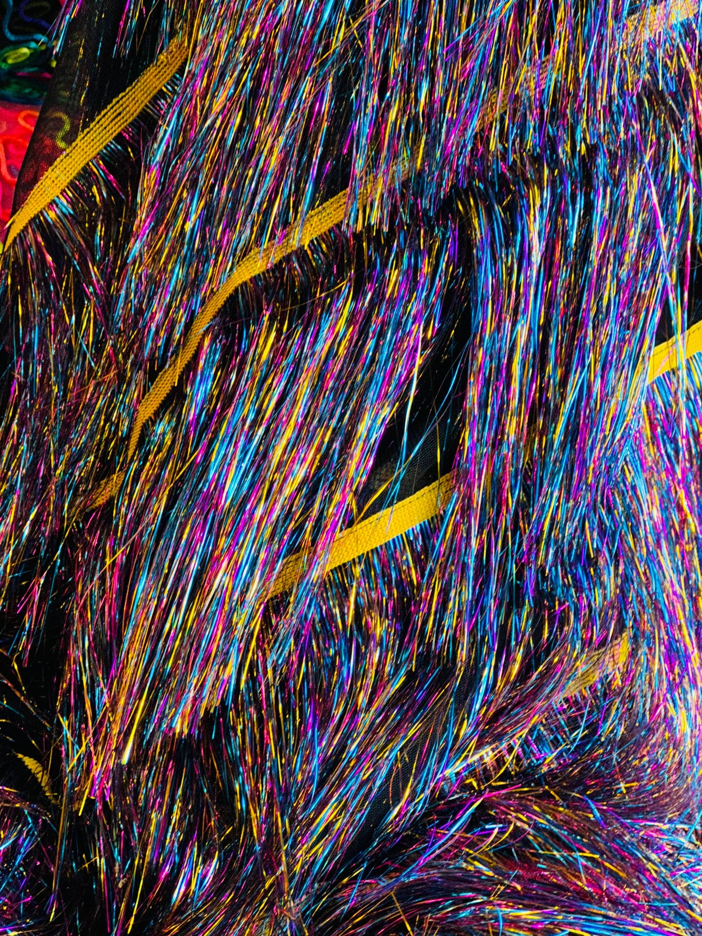 Fancy multi tinsel fringe design metallic long hair embroidered on stretch mesh 2-way stretch 58/60” Sold by the YD. Ships Worldwide from LA