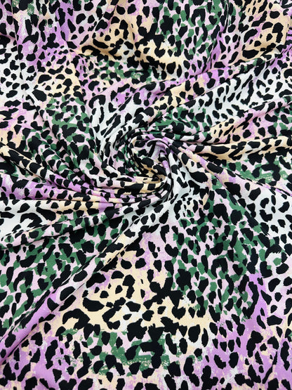 Exotic Leopard design multicolor nylon spandex 4-way stretch 58/60” Sold by the YD.