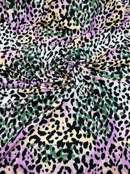 Exotic Leopard design multicolor nylon spandex 4-way stretch 58/60” Sold by the YD.