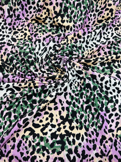 Exotic Leopard design multicolor nylon spandex 4-way stretch 58/60” Sold by the YD.