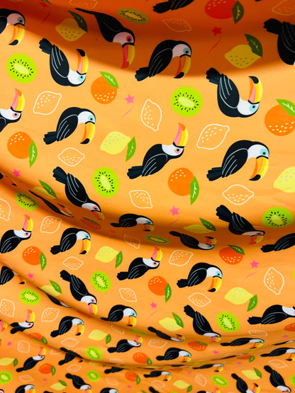 Toucan with tutti-frutti design print on great quality of Nylon spandex 4-way stretch 58/60” Sold by the YD. Ships worldwide