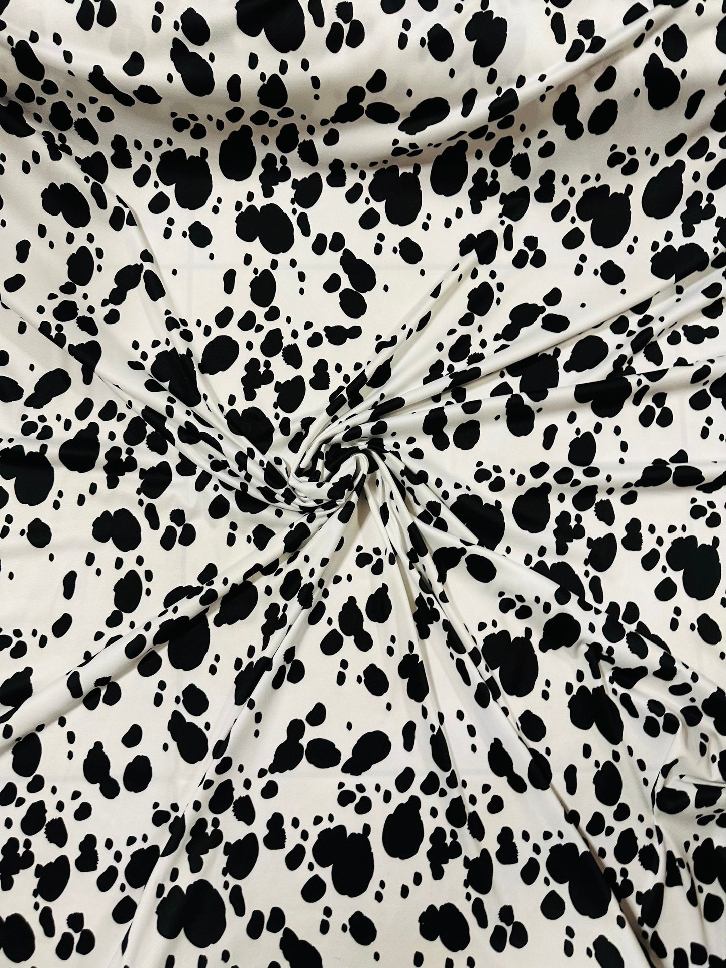 Dalmatian design print on great quality of poly spandex 2-way stretch 58/60” Sold by the YD. Ships Worldwide from Los Angeles California.