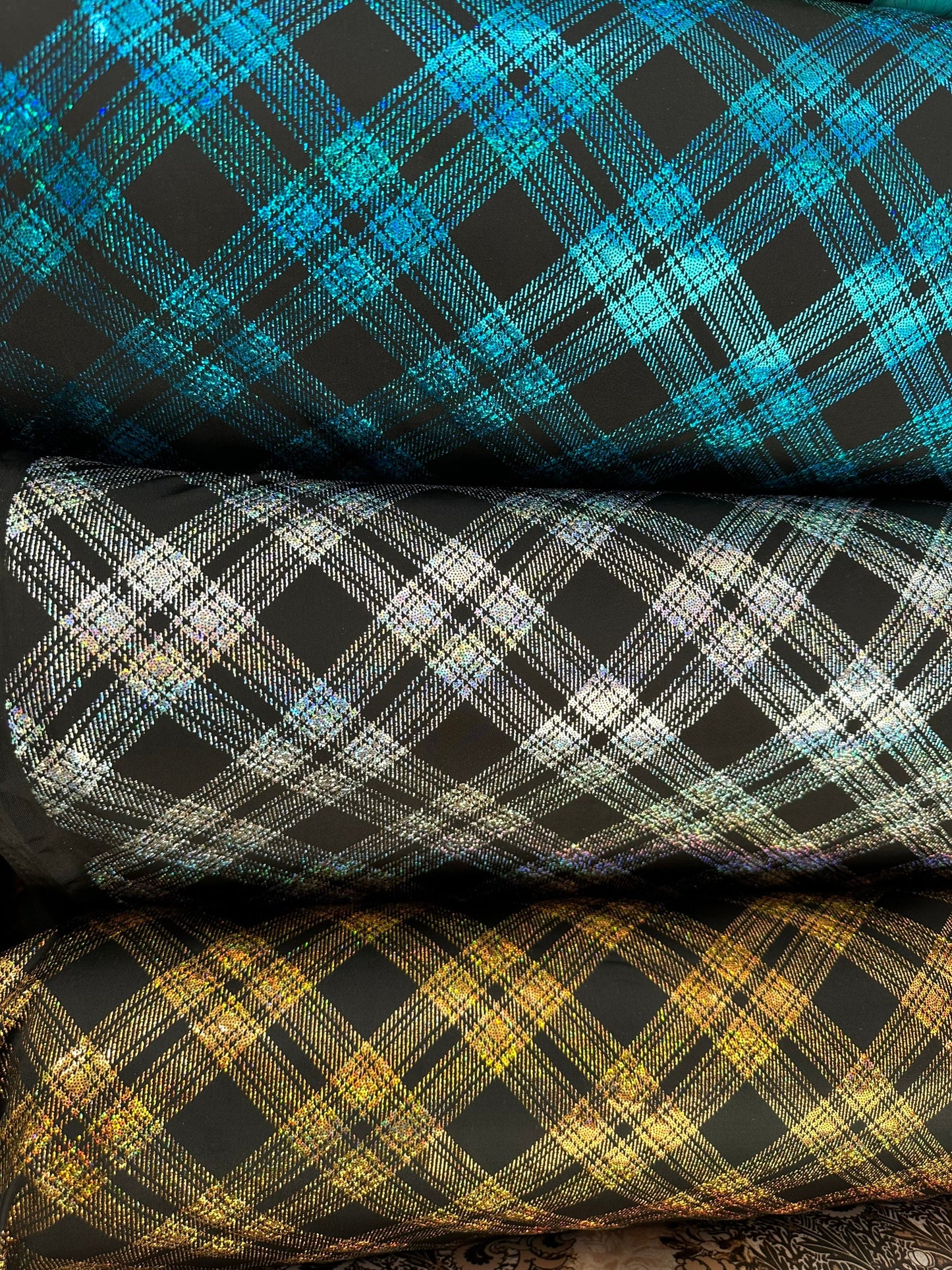 Metallic plaid design on great quality of nylon spandex 4-way stretch 58/60” Sold by the YD. Ships worldwide from Los Angeles California USA