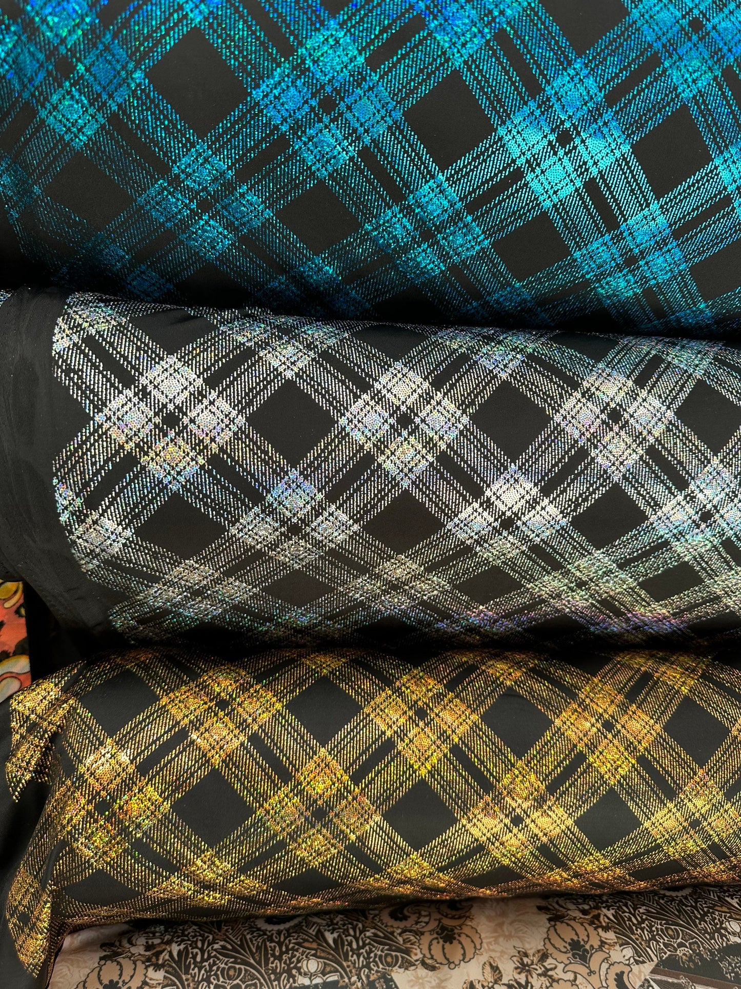 Metallic plaid design on great quality of nylon spandex 4-way stretch 58/60” Sold by the YD. Ships worldwide from Los Angeles California USA