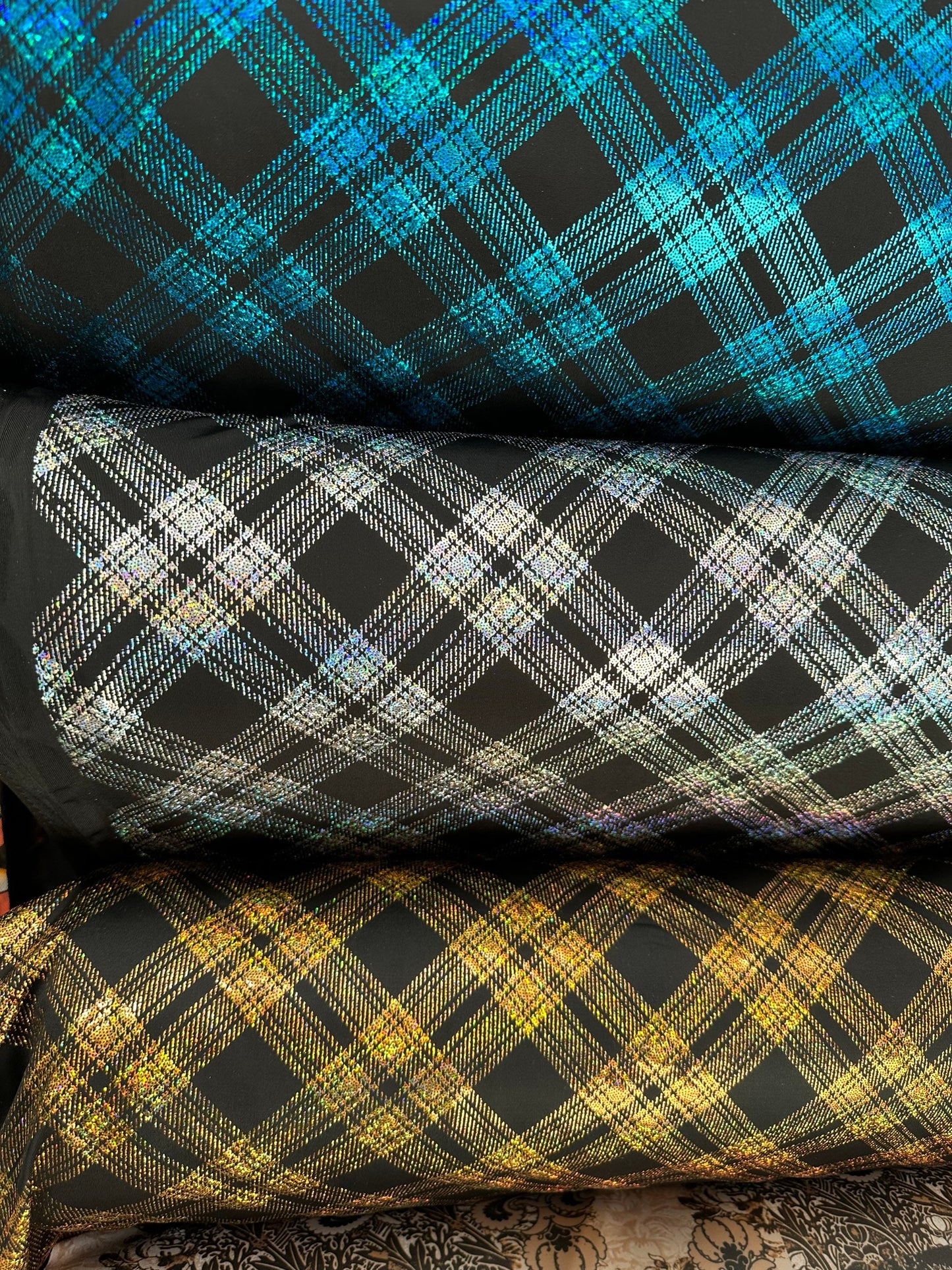 Metallic plaid design on great quality of nylon spandex 4-way stretch 58/60” Sold by the YD. Ships worldwide from Los Angeles California USA