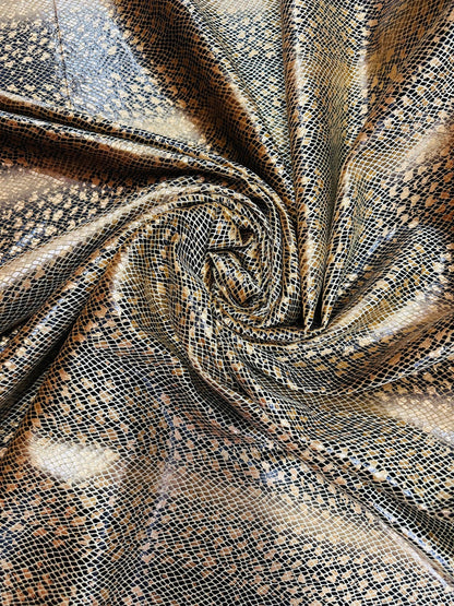 Skin snake design great quality of stretch velvet with foil Gold/Black 4-way stretch 58/60” Sold by the YD. Ships worldwide from L.A CA