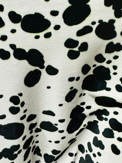 Dalmatian Exotic design print on great quality of stretch velvet 4-way stretch 58/60” Sold by the YD. Ships worldwide from L.A CA