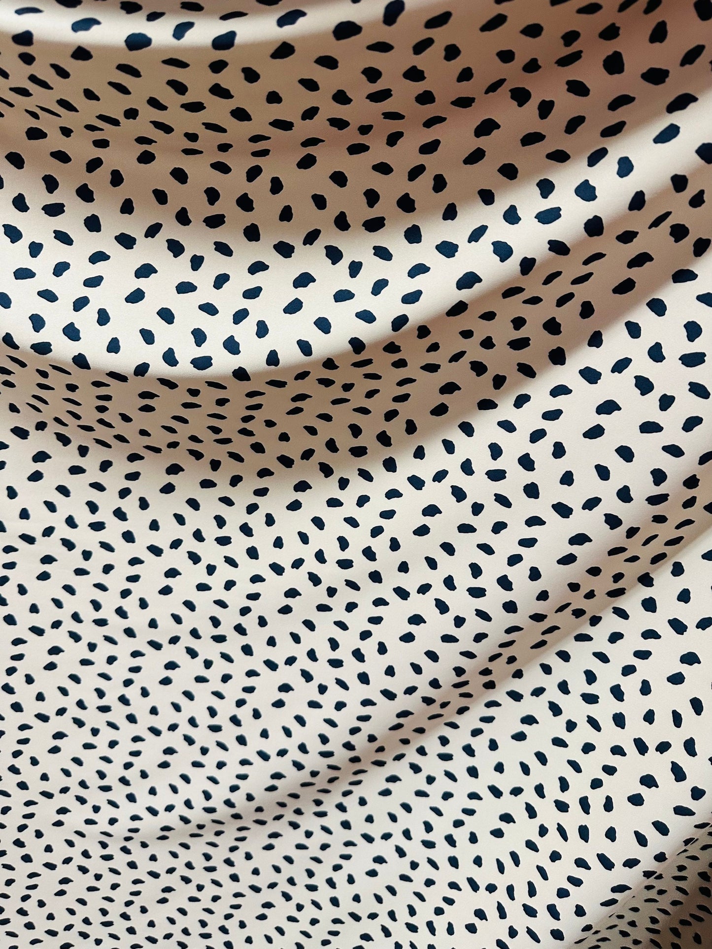 New Baby Dalmatian design print on great quality of nylon spandex 4-way stretch Nude/Black 4-way stretch 58/60” Sold by the YD.