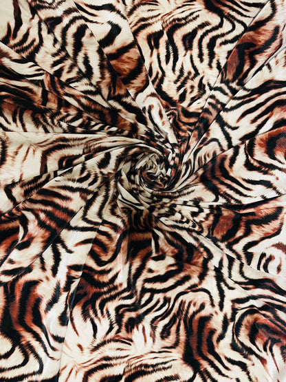 New Exotic Tiger design Natural/Brown print on great quality of stretch velvet 4-way stretch 58/60” Sold by the YD. Ships worldwide from L.A