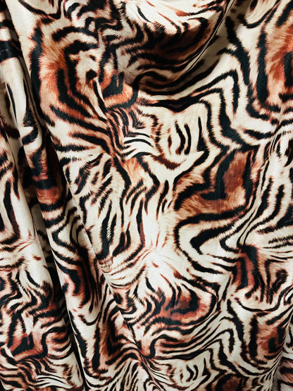 New Exotic Tiger design Natural/Brown print on great quality of stretch velvet 4-way stretch 58/60” Sold by the YD. Ships worldwide from L.A