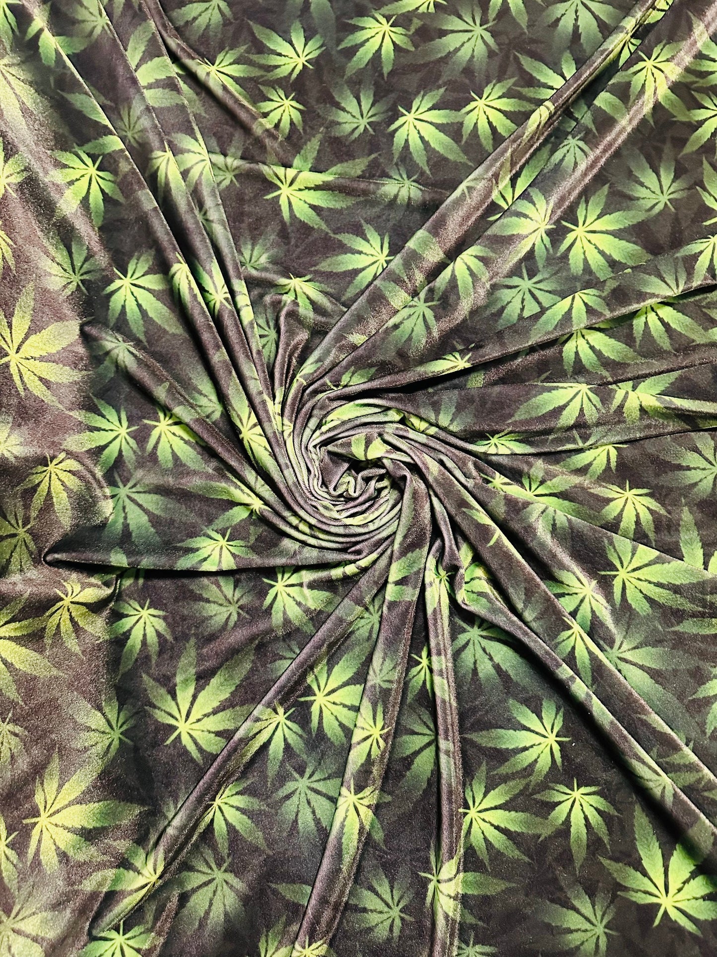 Marijuana leaf design print on great quality of stretch velvet 4-way stretch 58/60” Sold by the YD. Ships worldwide from L.A CA