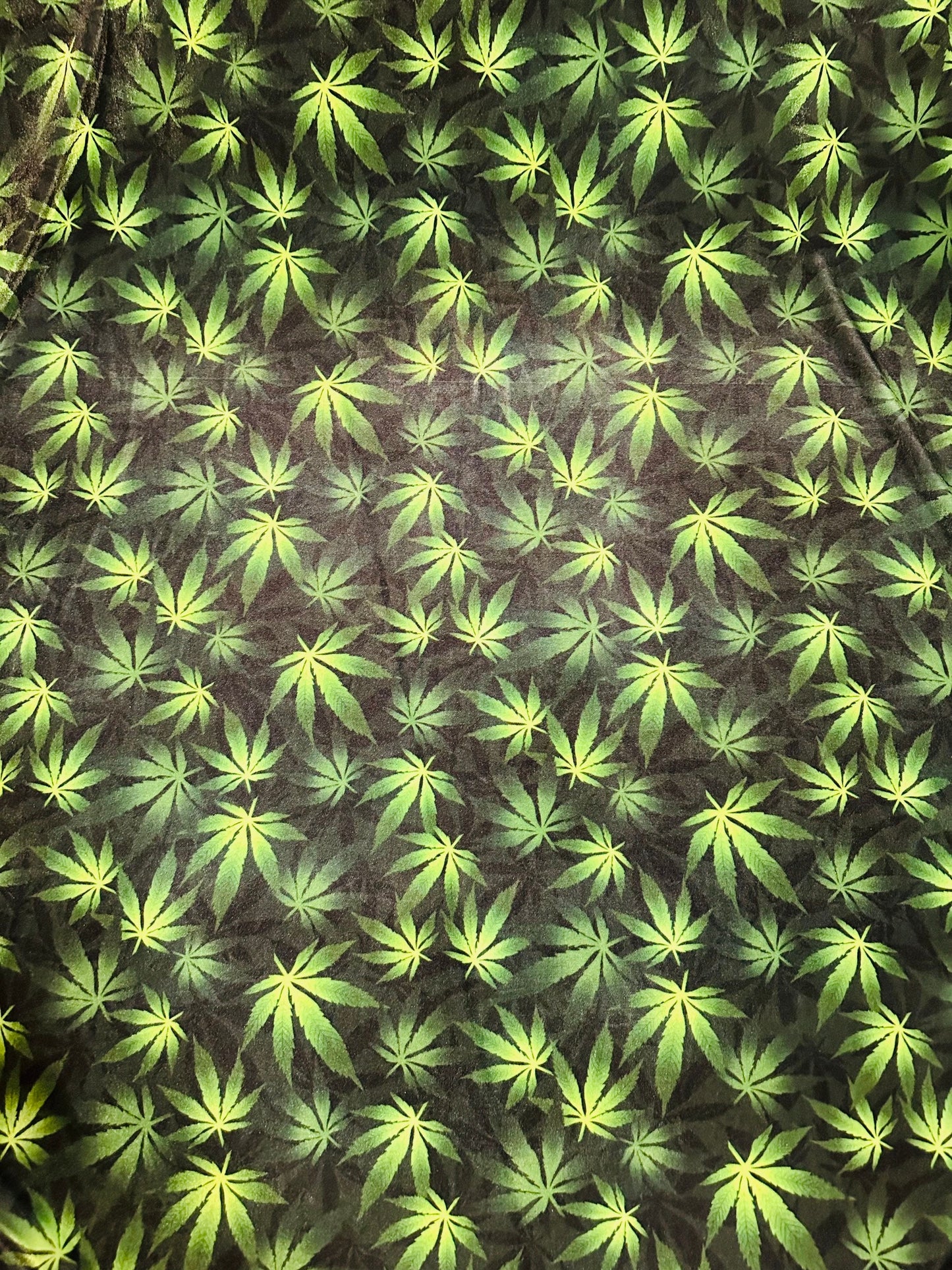 Marijuana leaf design print on great quality of stretch velvet 4-way stretch 58/60” Sold by the YD. Ships worldwide from L.A CA