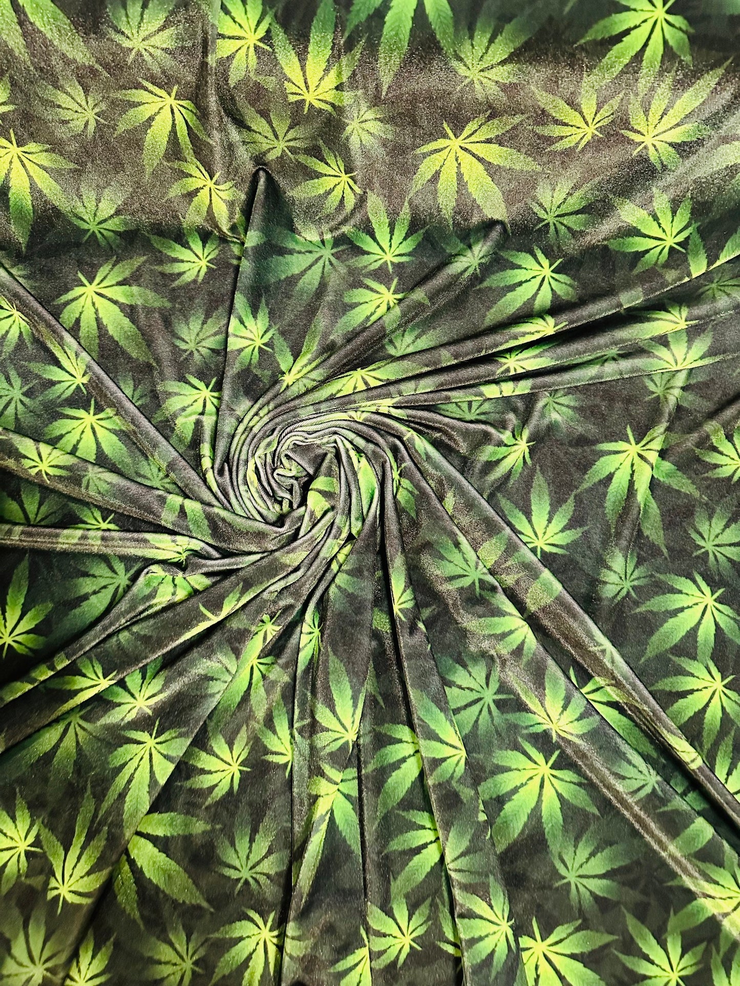 Marijuana leaf design print on great quality of stretch velvet 4-way stretch 58/60” Sold by the YD. Ships worldwide from L.A CA