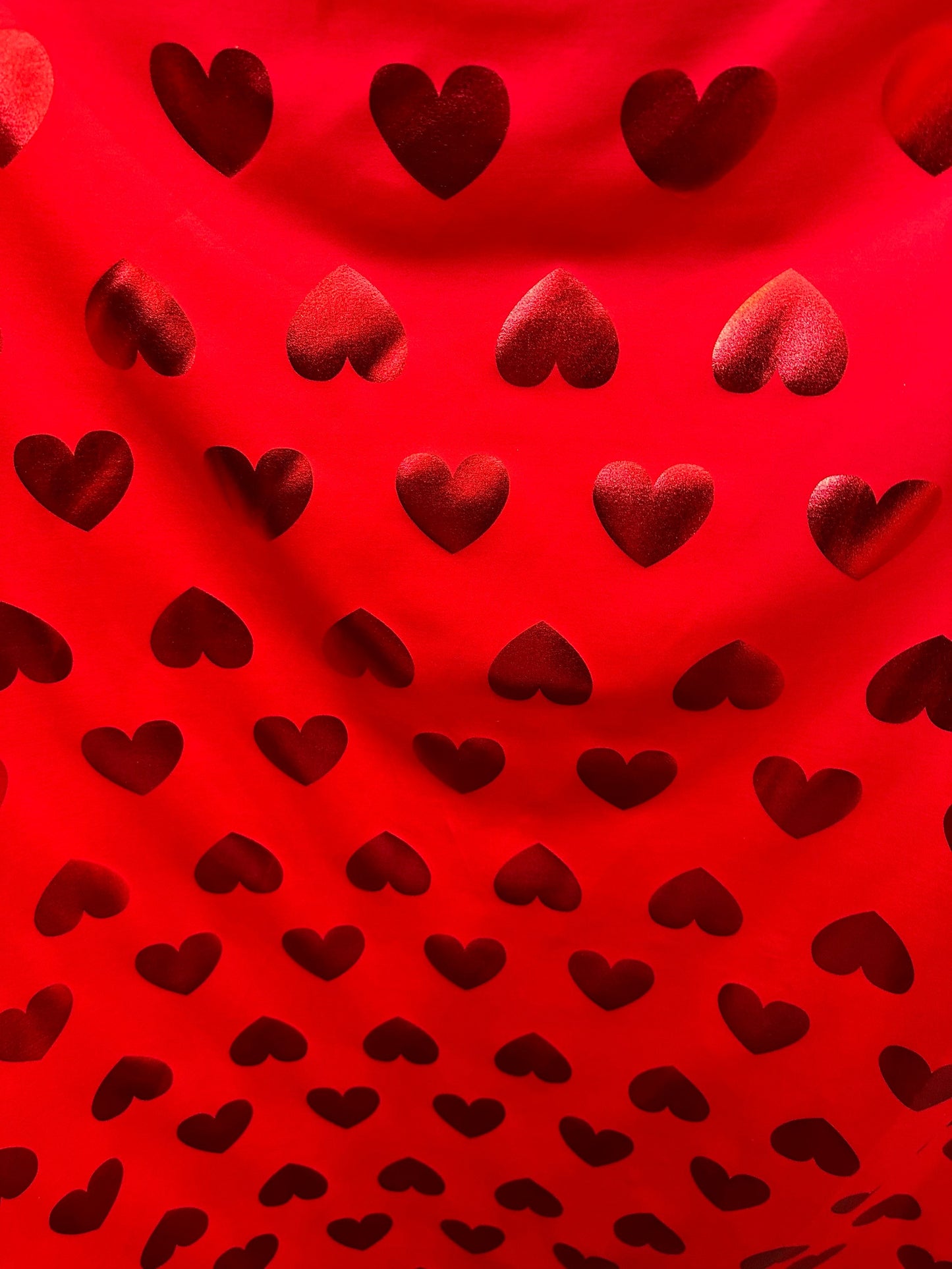 New Love me Hearts design nylon spandex with foil 4-way stretch 58/60” Sold by the YD. Ships worldwide from Los Angeles California USA