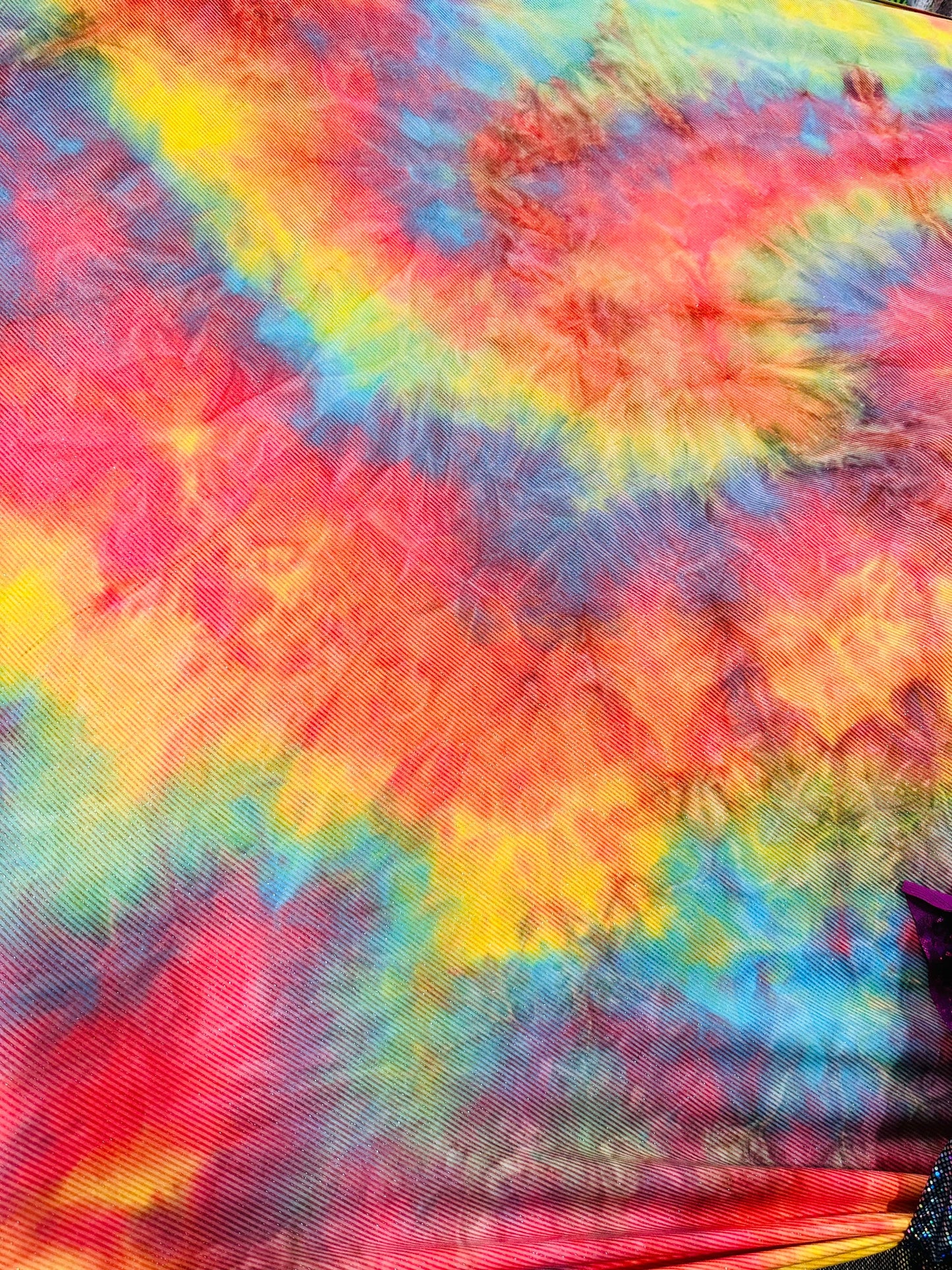 Tie dye rainbow print on great quality of poly spandex 2-way stretch 58/60” Sold by the YD. Ships worldwide from Los Angeles California USA