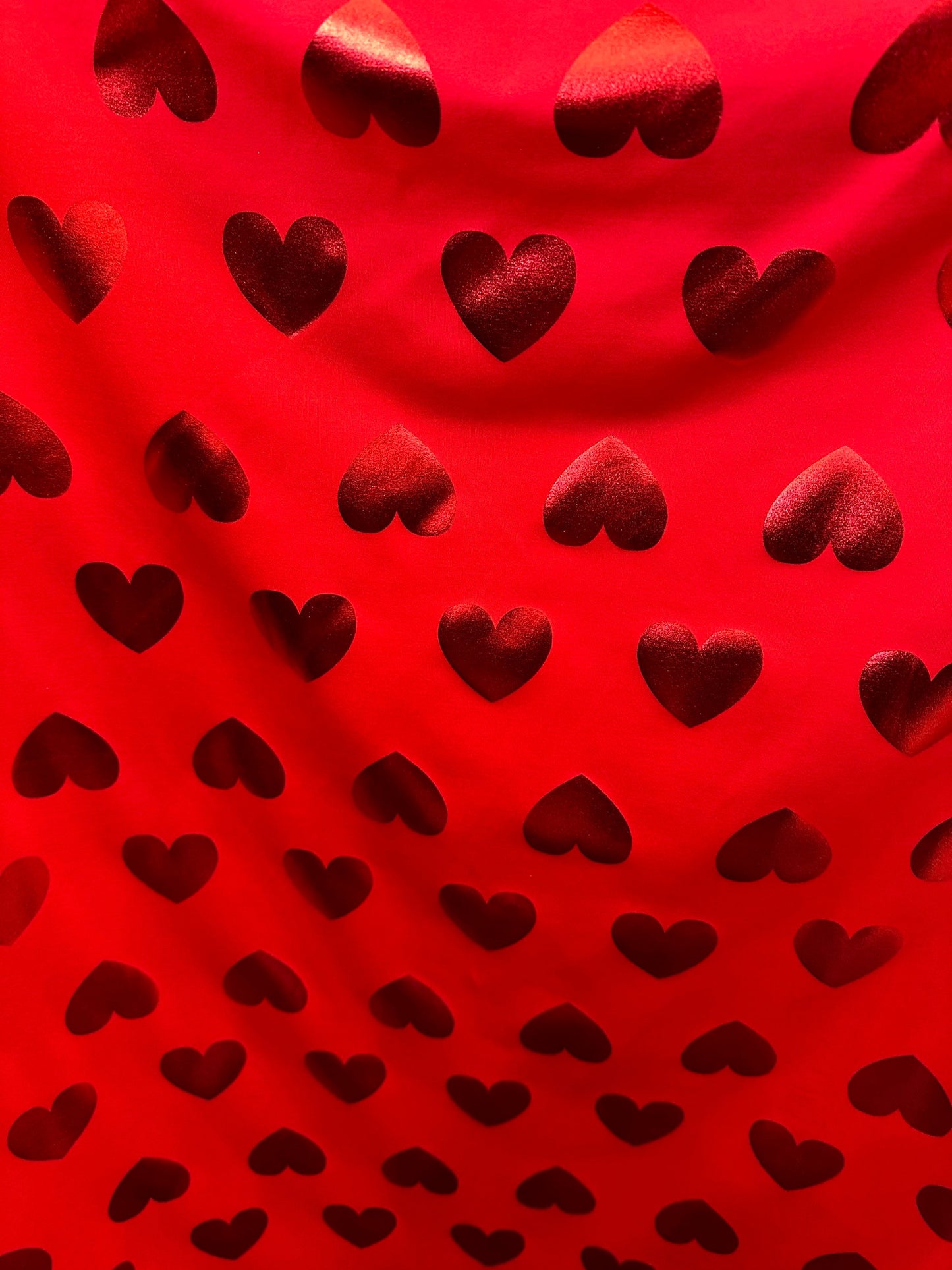 New Love me Hearts design nylon spandex with foil 4-way stretch 58/60” Sold by the YD. Ships worldwide from Los Angeles California USA