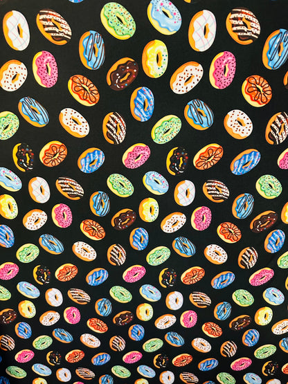 New donuts design Black multicolor print on great quality of nylon spandex 4way Stretch 58/60” Sold by the yd. Ships worldwide from L.A