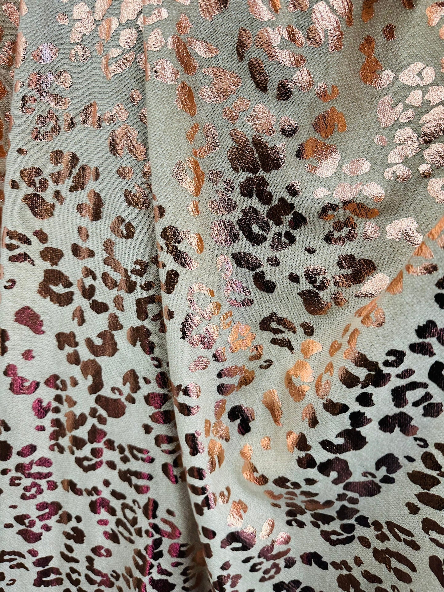 New French Terry fabric with foil leopard design high quality 2-way stretch 58/60” Sold by the YD. Ships worldwide from L.A CA